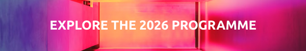 A vibrant, colorful background banner with bold white text reading: EXPLORE THE 2026 PROGRAMME.